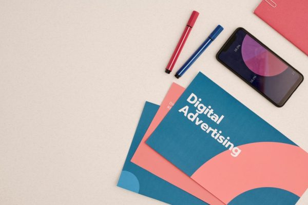 flat-layout-of-digital-advertising-brochures-and-phone-with-financial-diagram